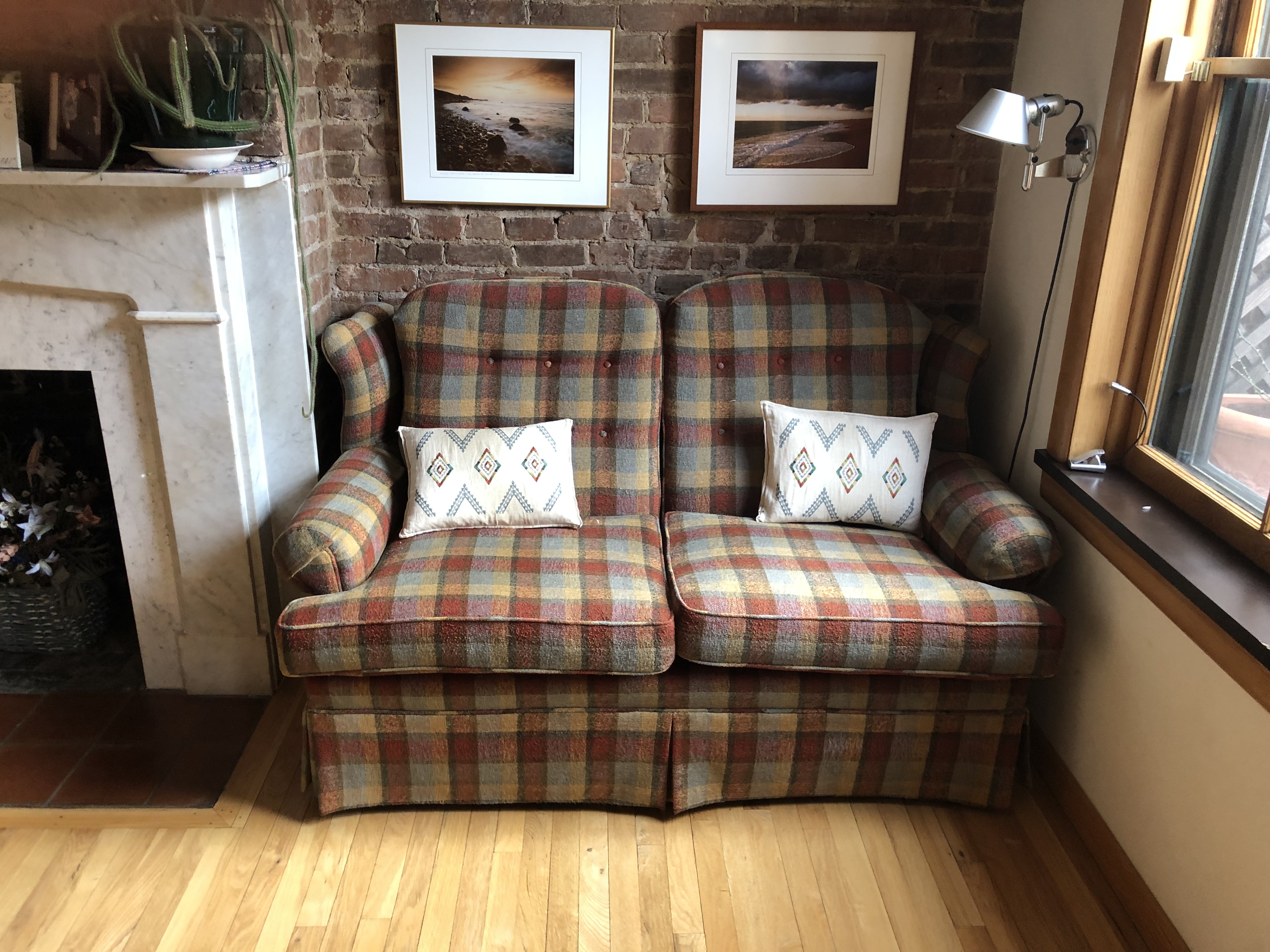 Plaid upholstered loveseat