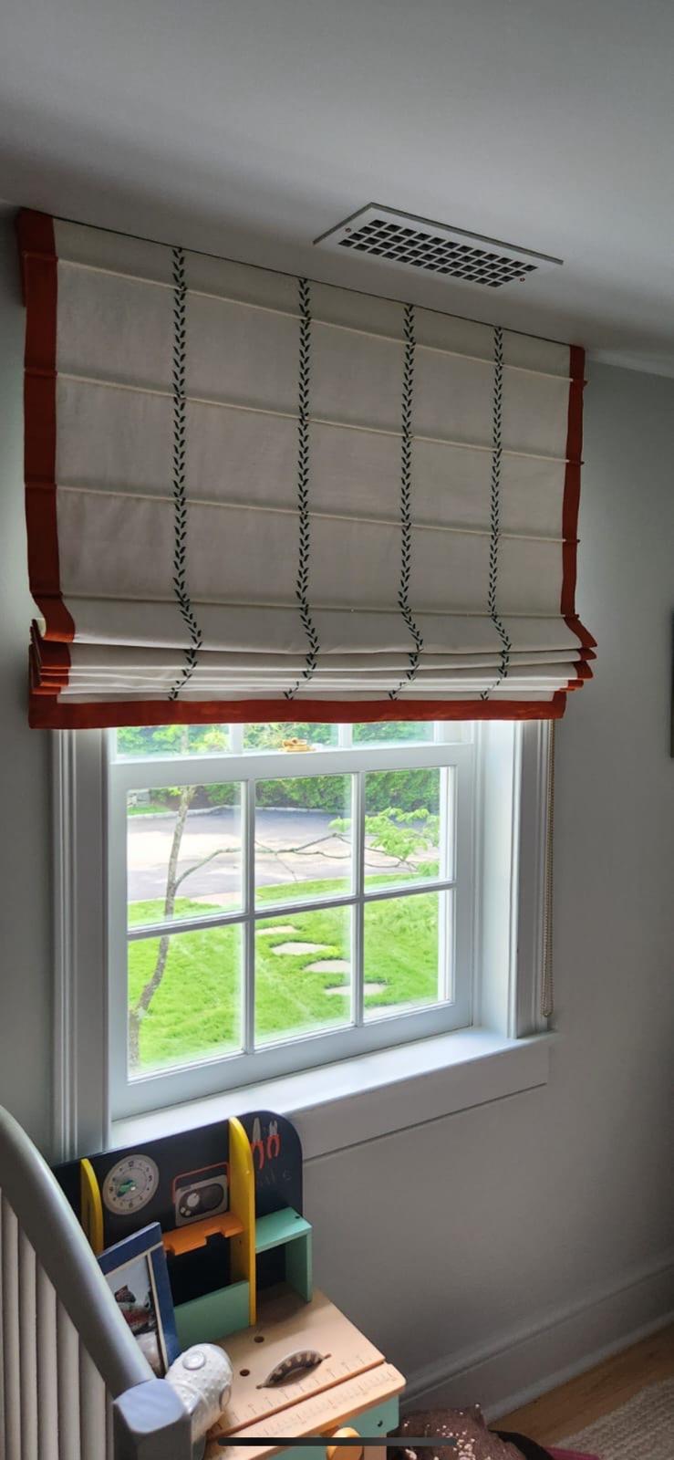 Roman shade installed in home