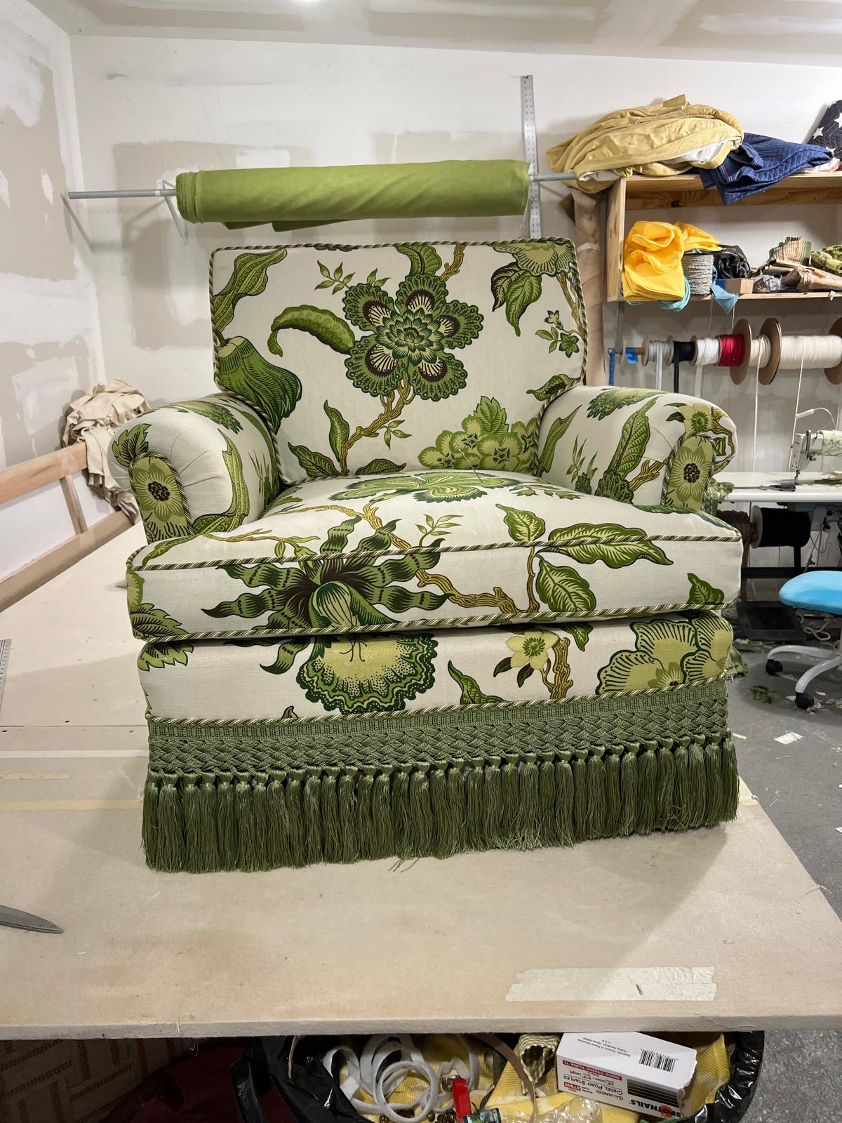 Green botanical chair with fringe
