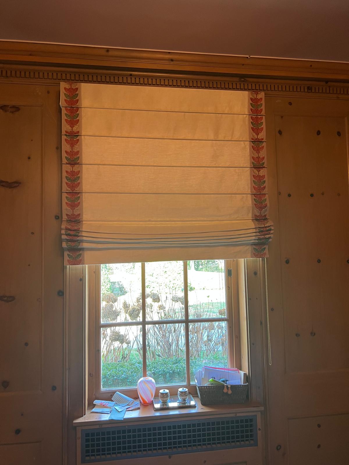 Floral roman shade installed