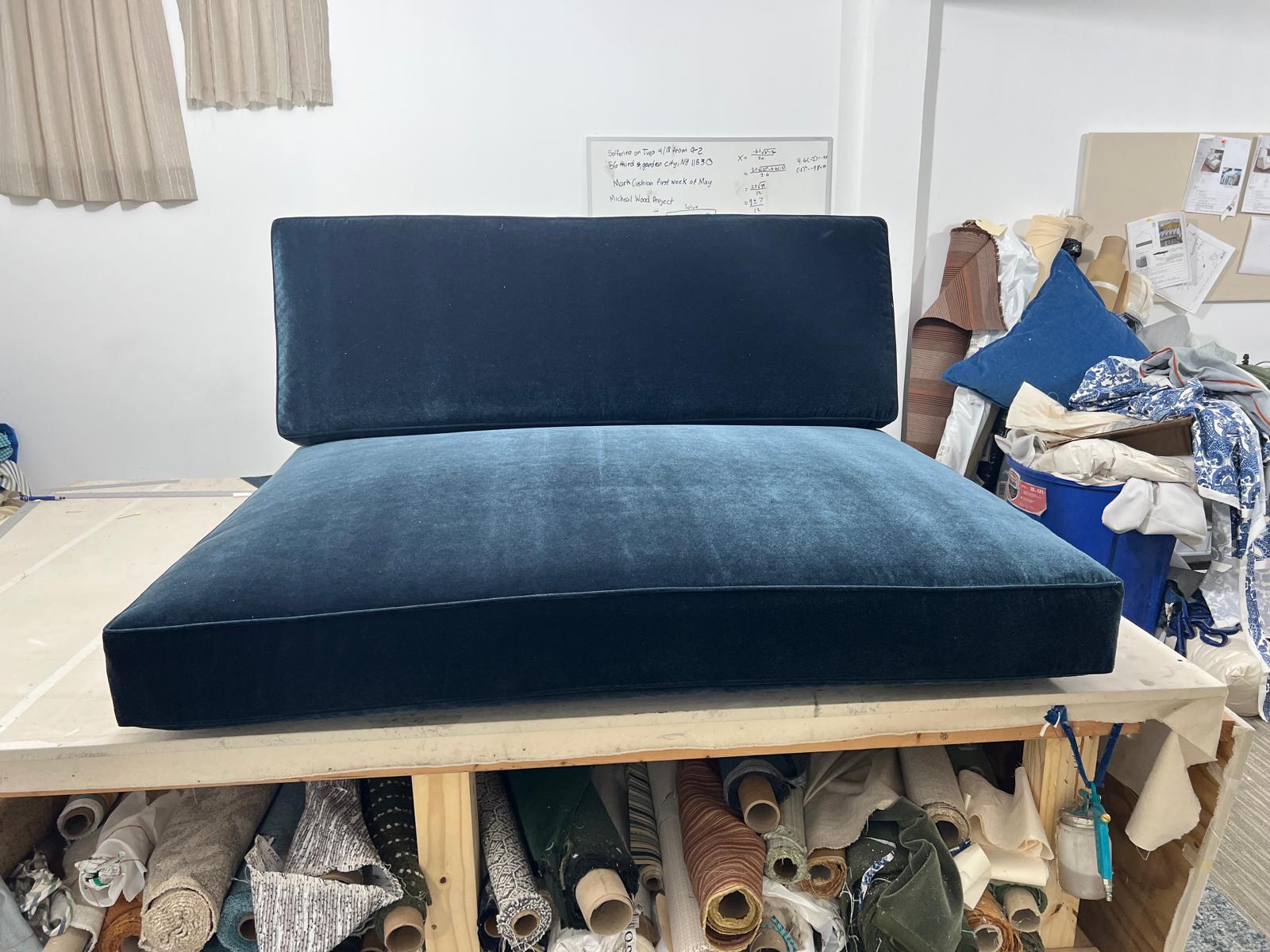 Navy velvet cushions in workshop