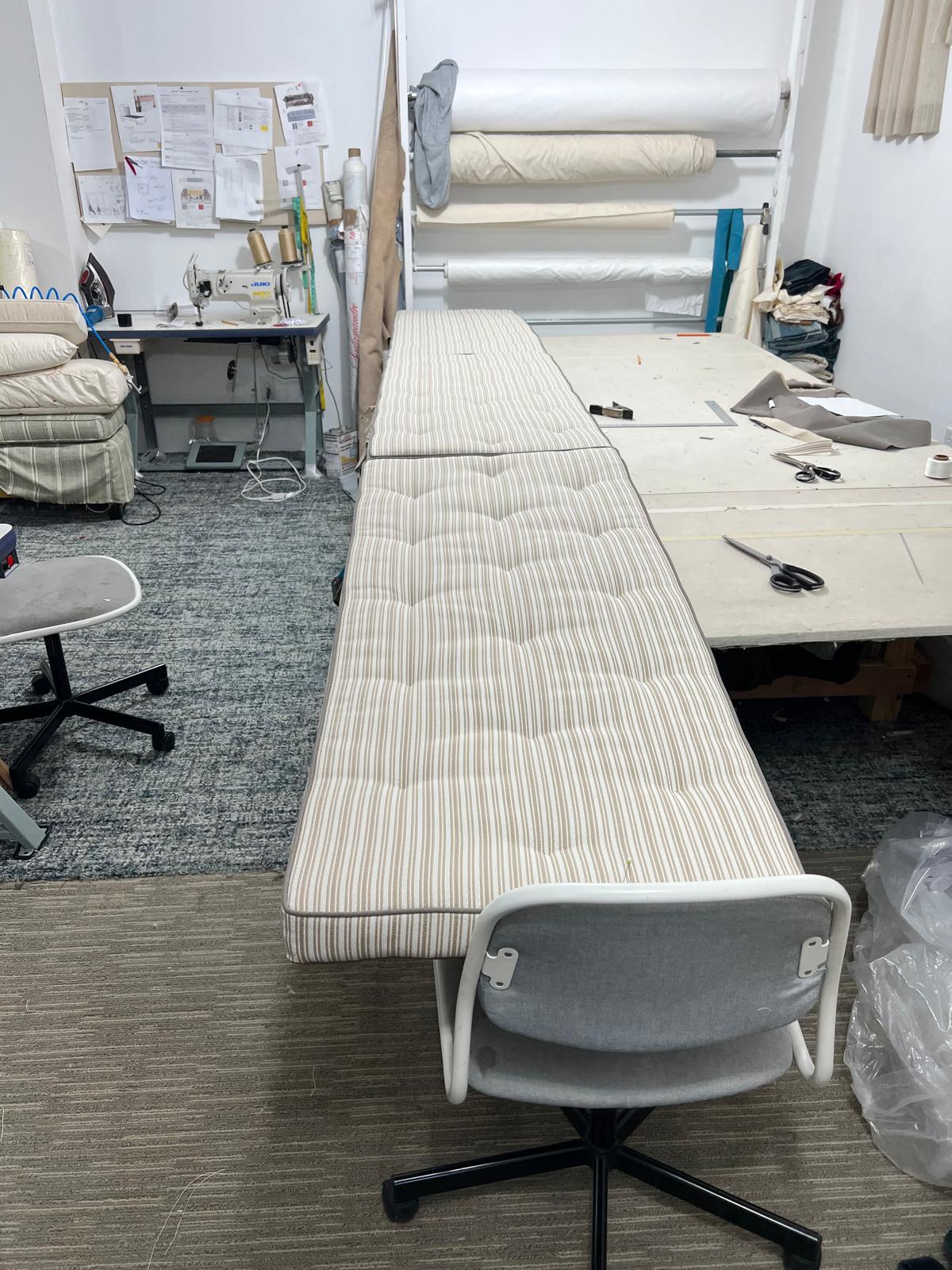 Long tufted striped banquette