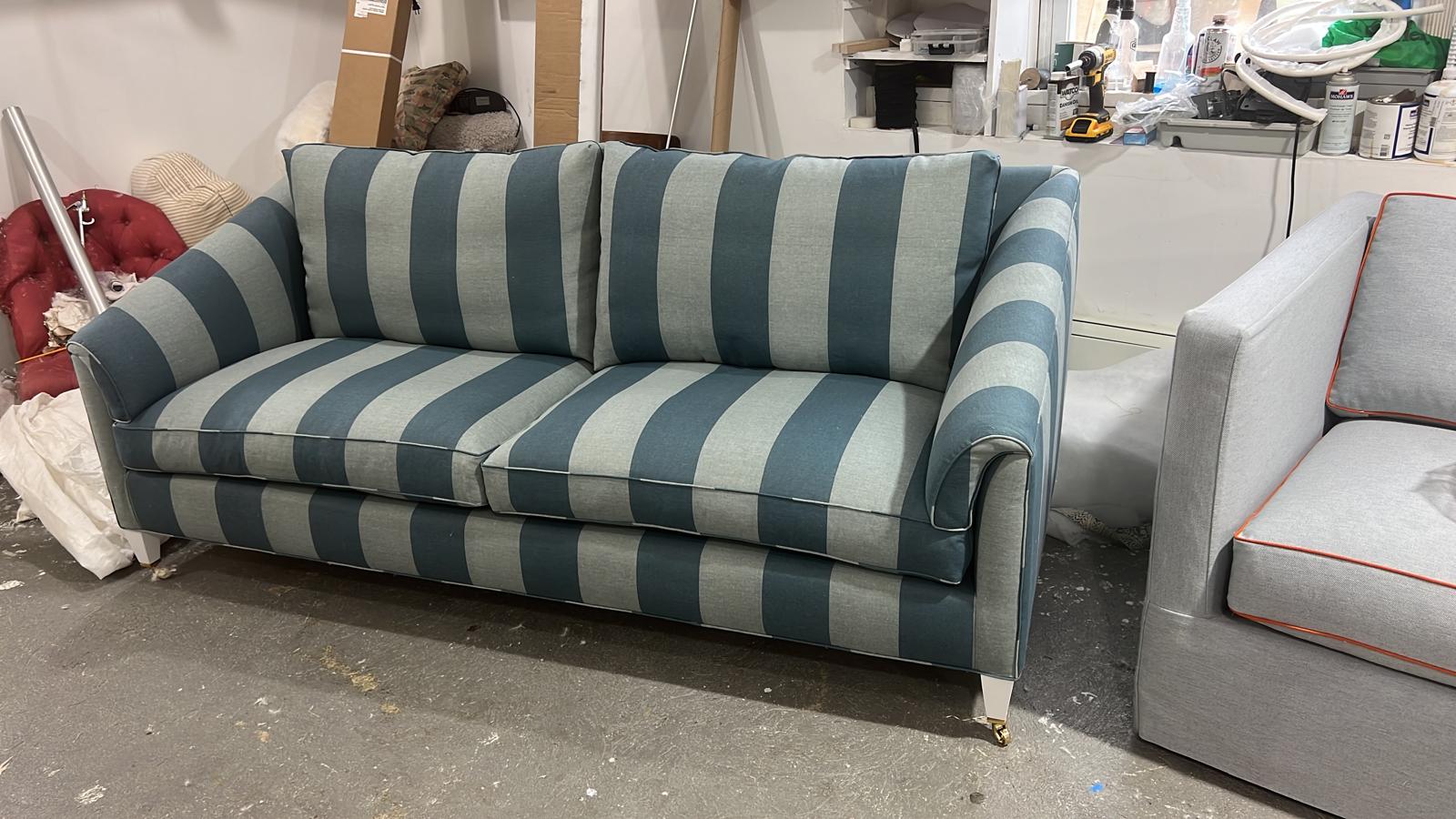 Teal striped sofa