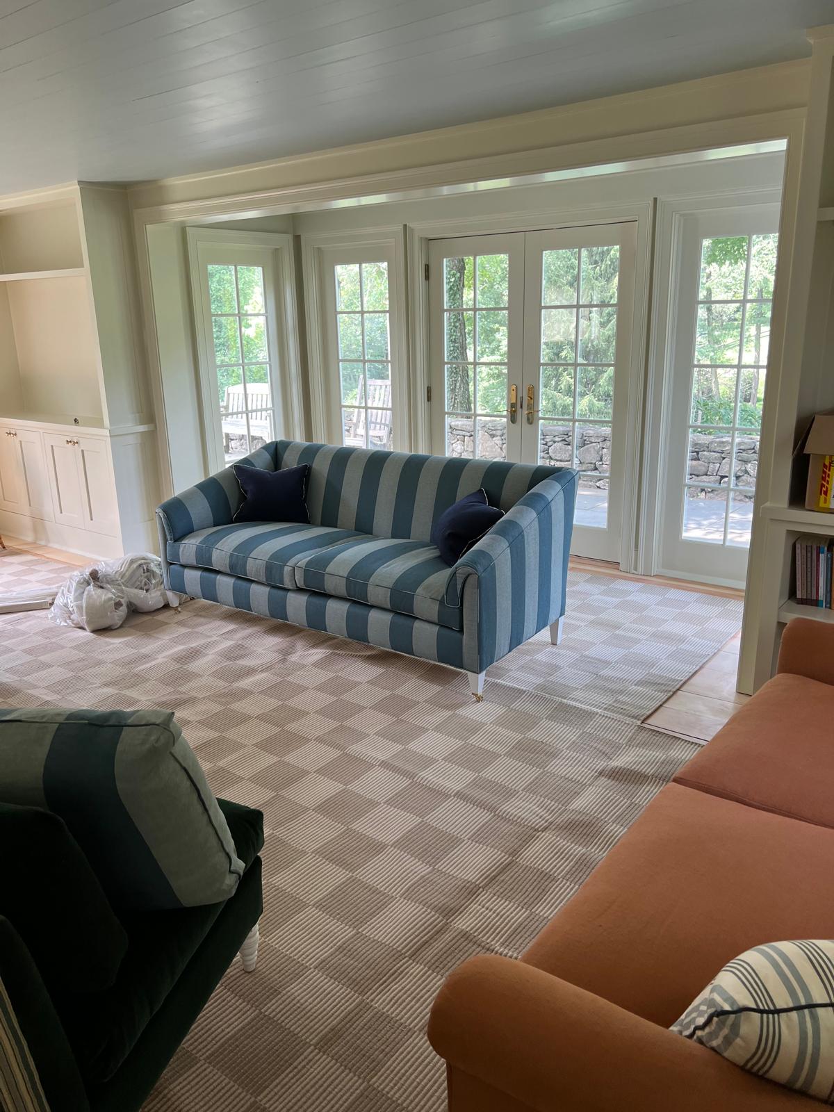 Blue striped sofa in living room