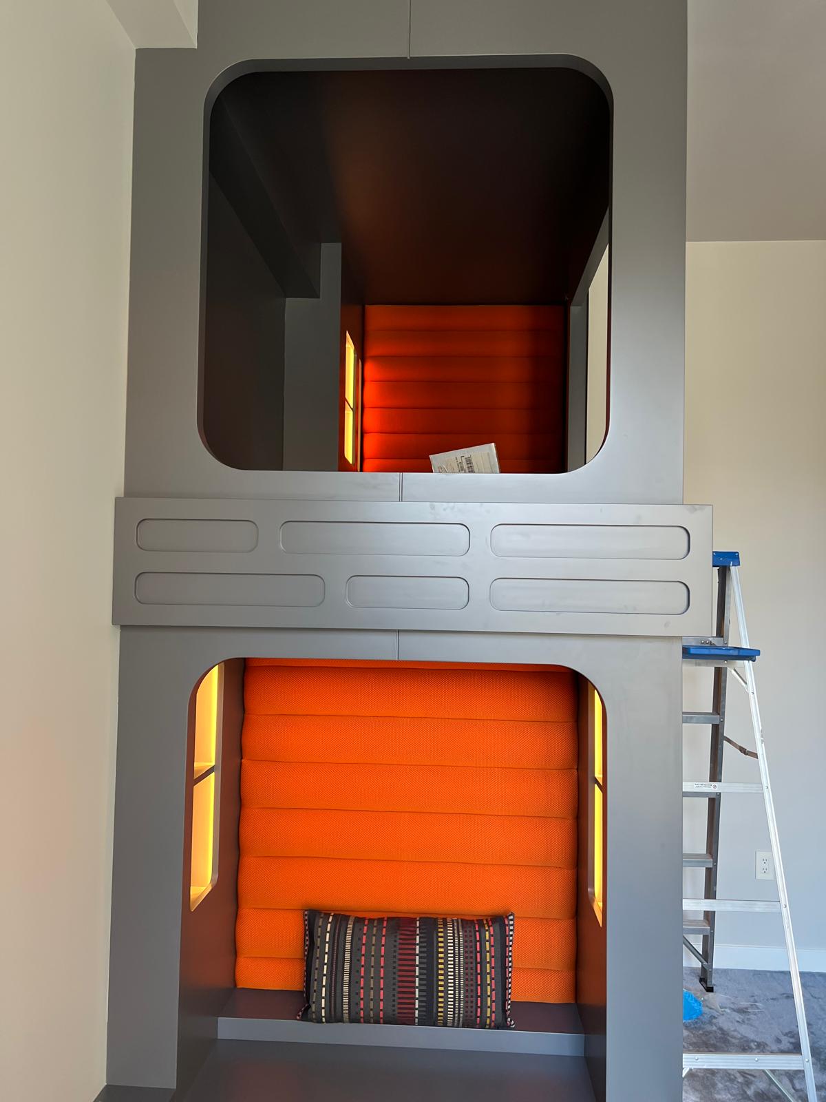 Custom orange upholstered bunk pod cushions