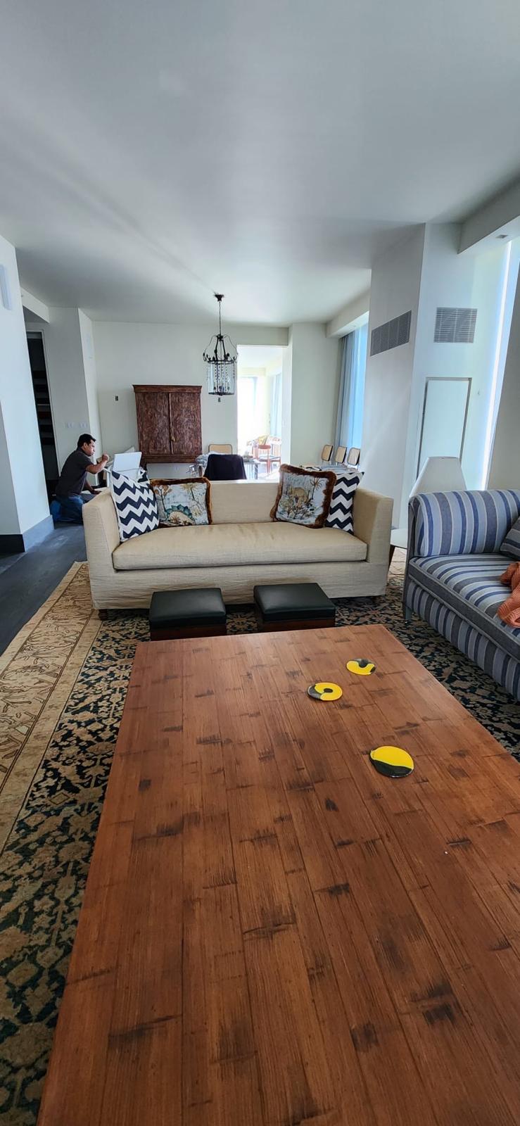Cream sofa with decorative pillows in living room