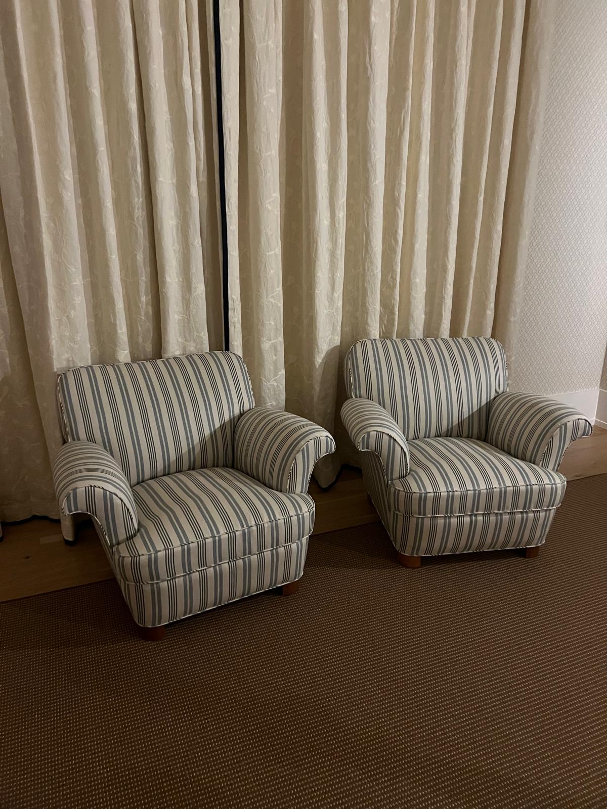 Pair of blue and white striped arm chairs
