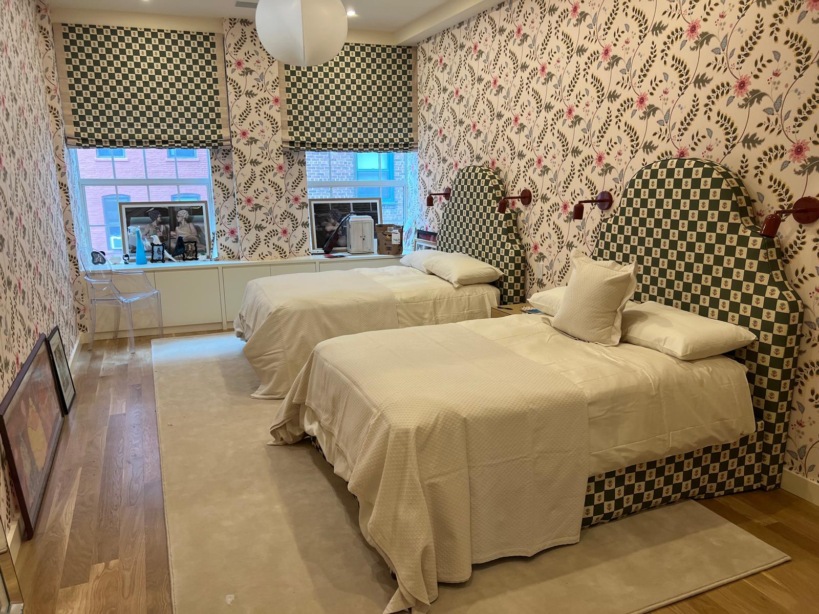 Green checkered twin headboards with matching roman shades in child's room