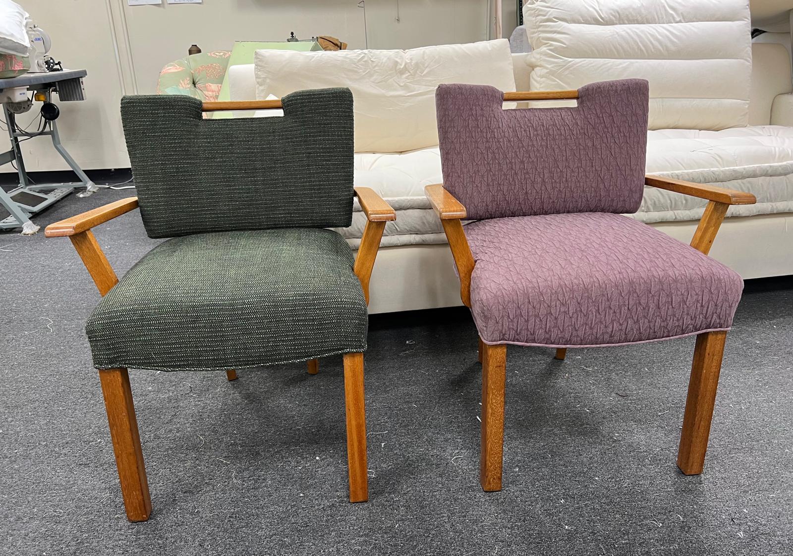 Green and mauve arm chairs in workshop